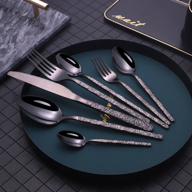 Premium steak cutlery set with embossed textured handles, made of durable stainless steel for a refined dining experience.