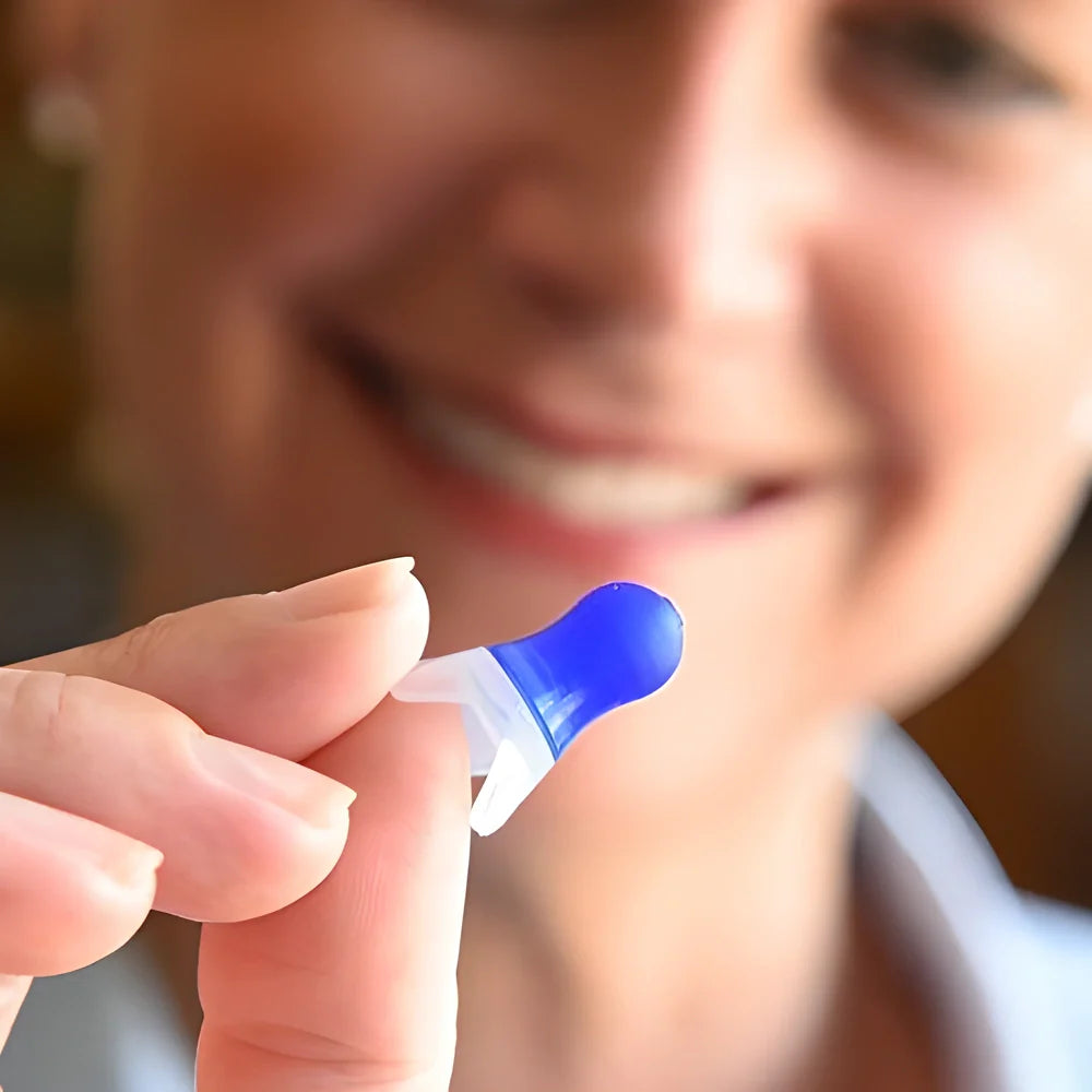 Multipurpose pressure-equalising earplugs in blue silicone with clear flanges, designed for comfortable in-flight use and various noise-filled activities.
