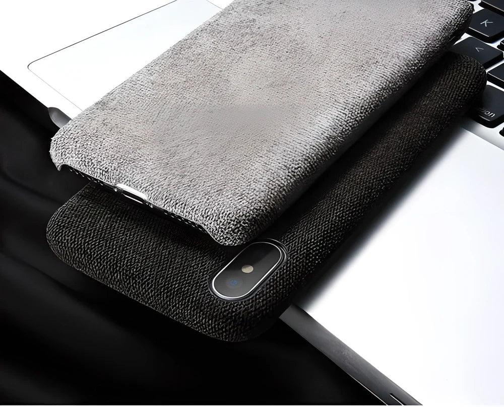 Stylish textile cloth phone case for iPhone, featuring a soft, lightweight design and precision-engineered construction for a perfect fit.