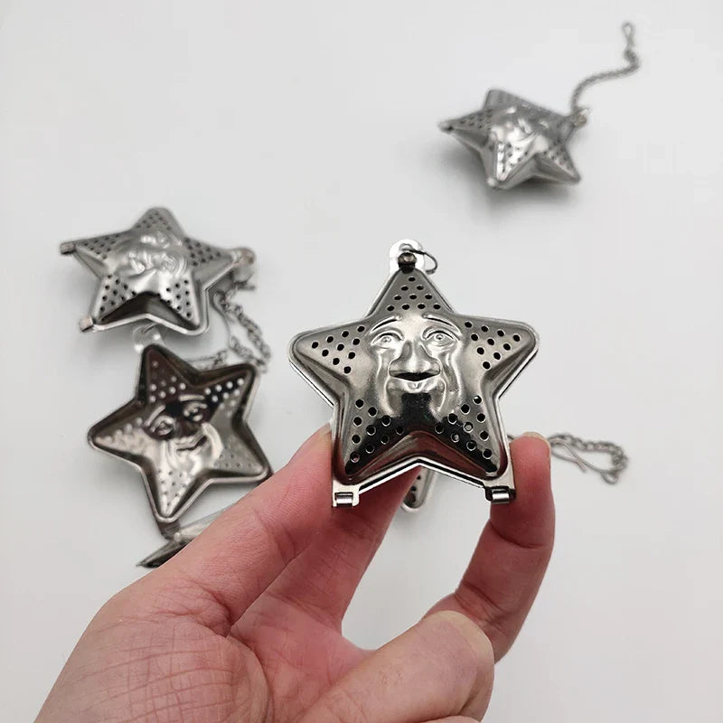 Adjustable stainless steel star-shaped tea infuser for brewing loose leaf tea with hanging mechanism