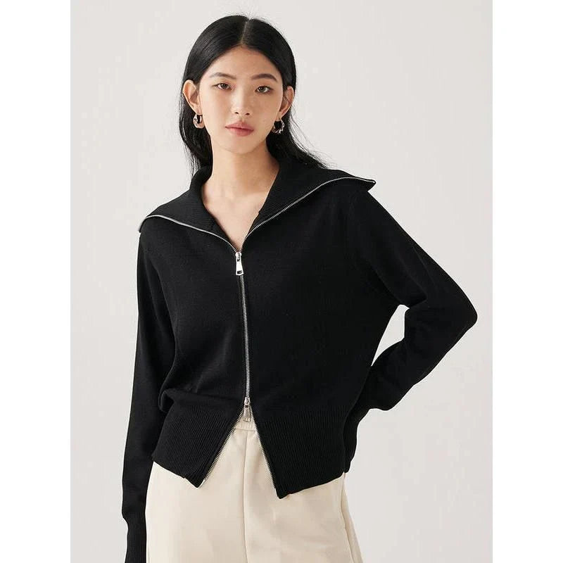 Elegant black silk-cotton blend cardigan with zipper closure, featuring a refined A-straight design and stylish details