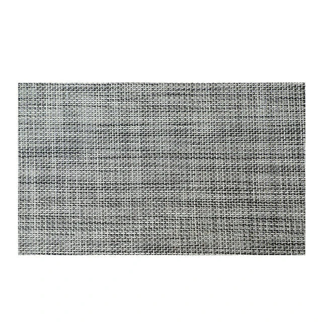 Stylish and durable waterproof placemats in black, protecting a dining table from spills and stains