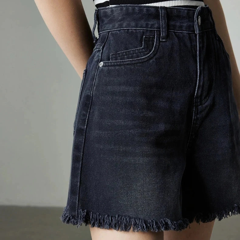 Vintage-inspired high-waisted denim shorts with tassel detailing for women
