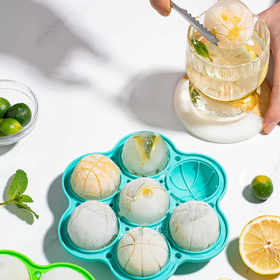 Spherical silicone ice mould with seven holes for creating perfectly round ice spheres to chill drinks