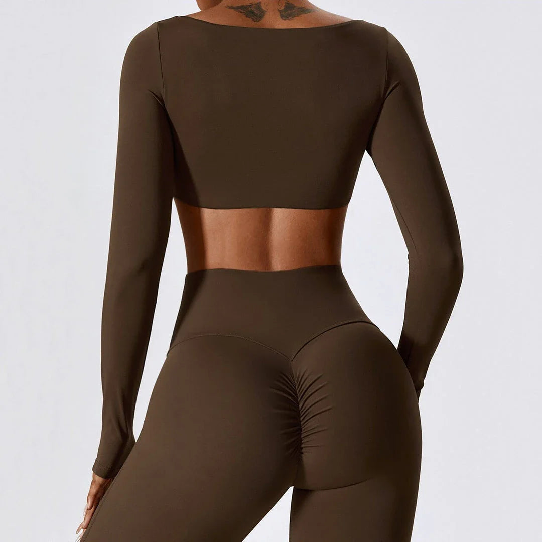 Stylish long sleeve crop top yoga shirt in green, designed for comfort and performance during workouts