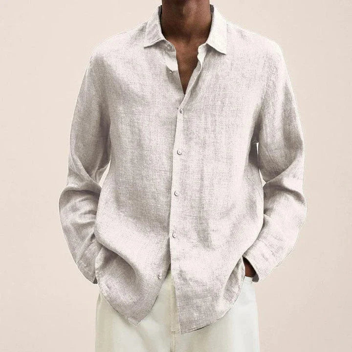 Stylish men's oversized button-up cardigan shirt in a classic solid colour, featuring a relaxed fit and sophisticated lapel collar design.