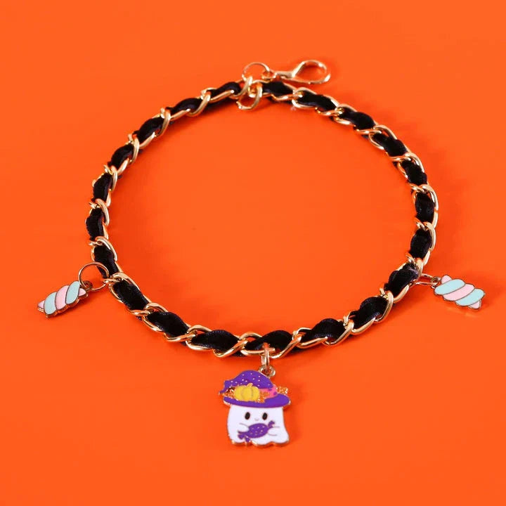A pet collar made of premium velvet with metal bat charms, perfect for Halloween festivities