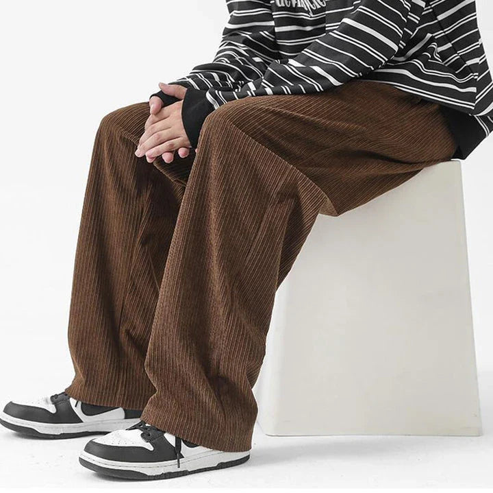 Premium fleece-lined corduroy trousers in a range of versatile colours, featuring a relaxed, straight-leg silhouette for a sophisticated, comfortable look.