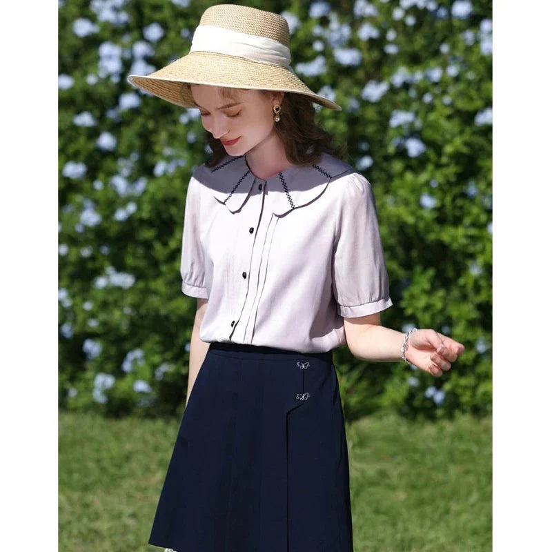 Elegant French puff sleeve blouse with timeless Peter Pan collar, available in purple and various sizes