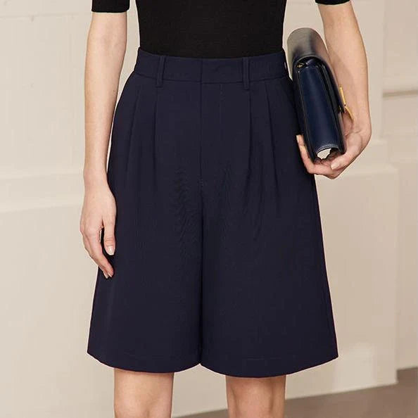 Elegant wide-leg shirred shorts for women, featuring a refined design and comfortable fit for the British summer