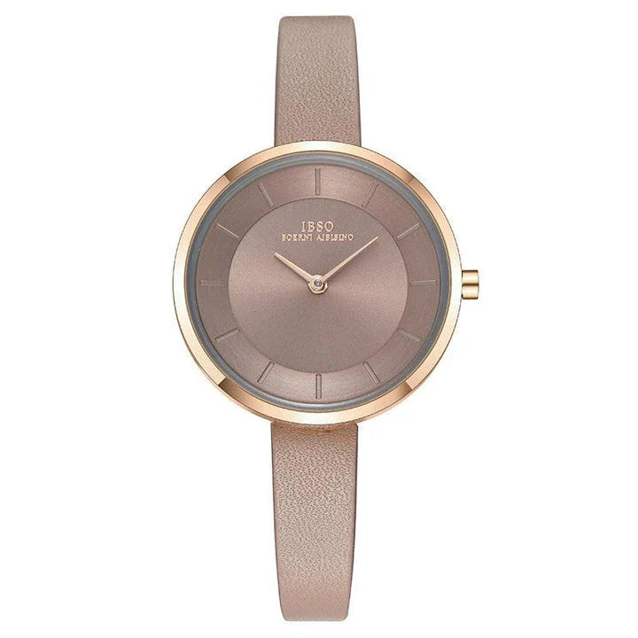 Stylish slim ladies' waterproof watch in various colours, including black, tan, grey, and white, with rose gold or silver accents.