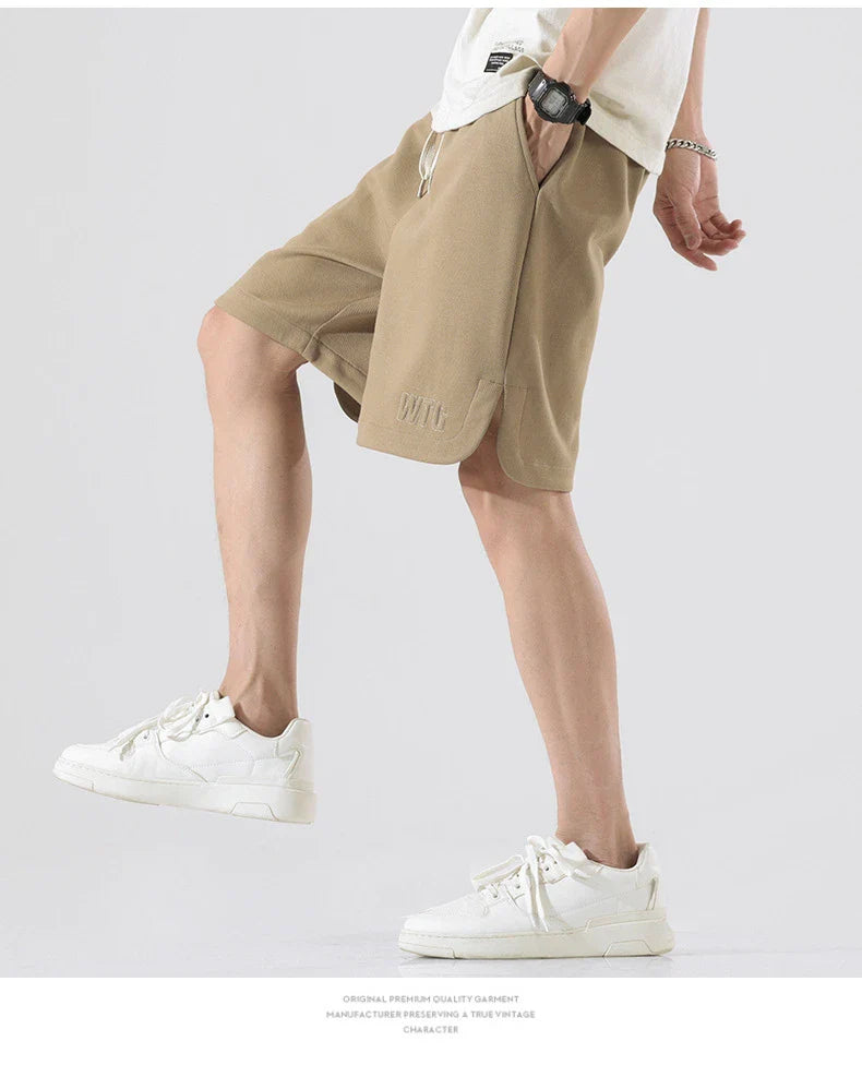 Premium British-made knitted sports shorts in a variety of classic colours, featuring an elastic waistband and loose, comfortable fit.