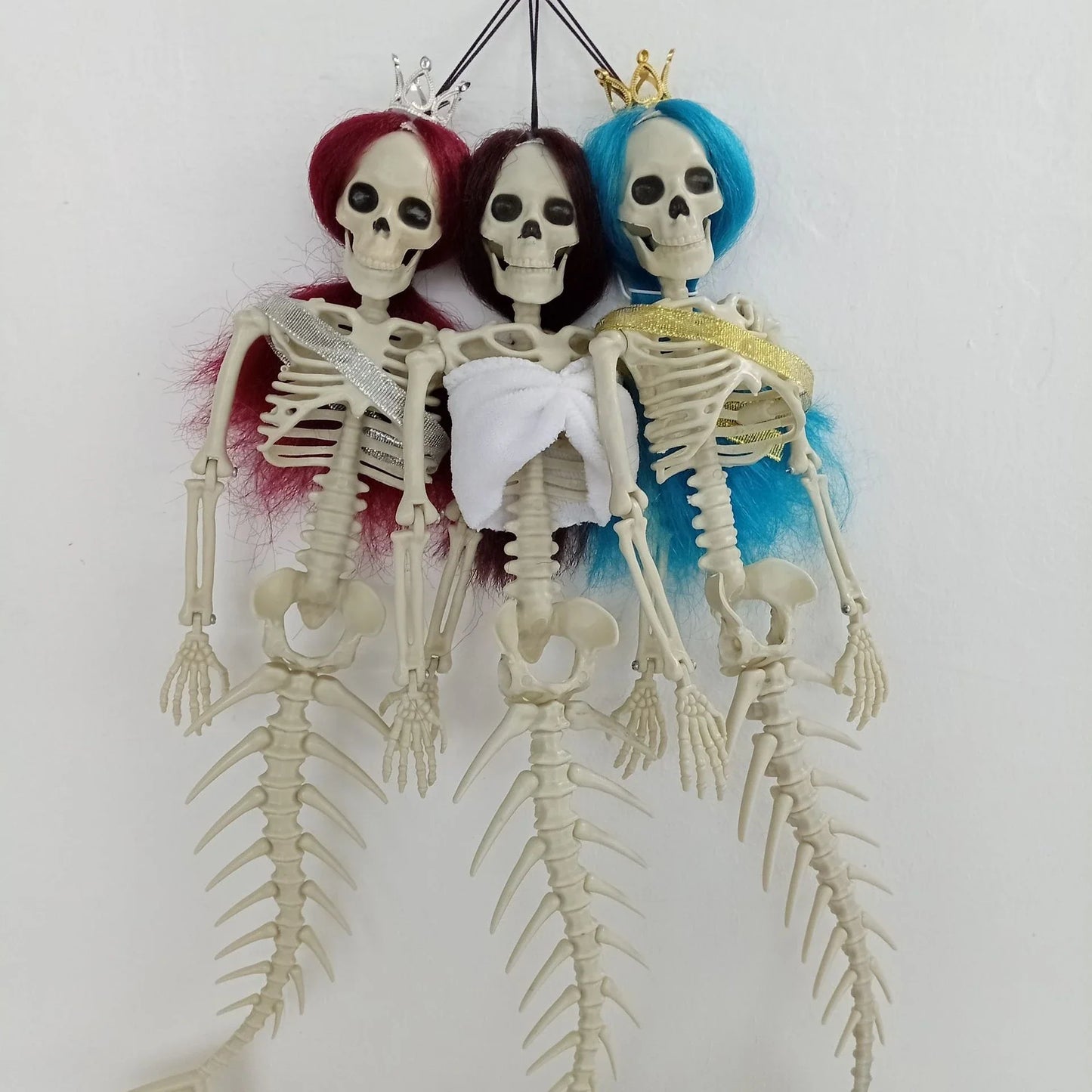 Mermaid bone pendant decoration in brown, dark purple, burgundy, and lake blue colours, ideal for Halloween outdoor courtyard displays