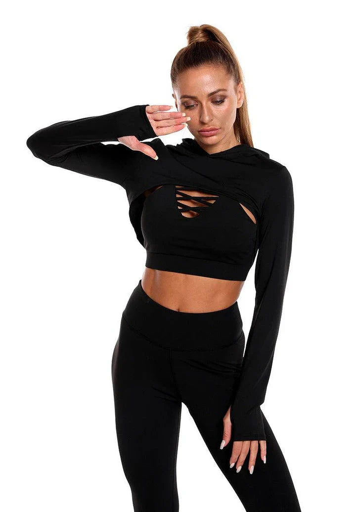A 3-piece sports set including a hooded top, sports bra, and high-waisted leggings in a black colour scheme.