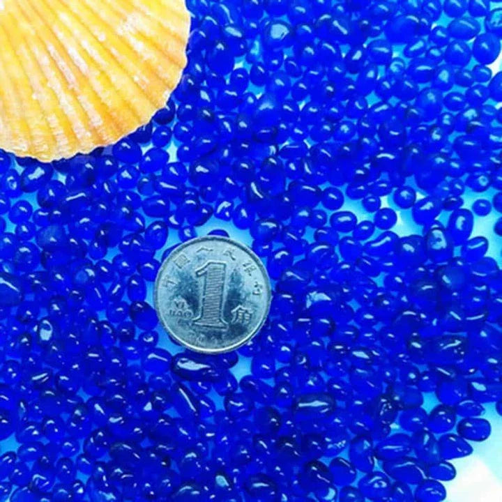 Premium blue aquarium gravel with smooth, rounded pebbles for a safe and comfortable underwater environment