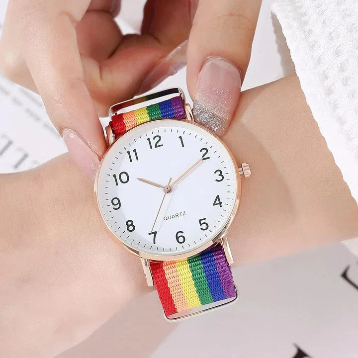 A stylish rainbow-coloured women's wristwatch with a quartz movement and an alloy case for elegant and durable design.