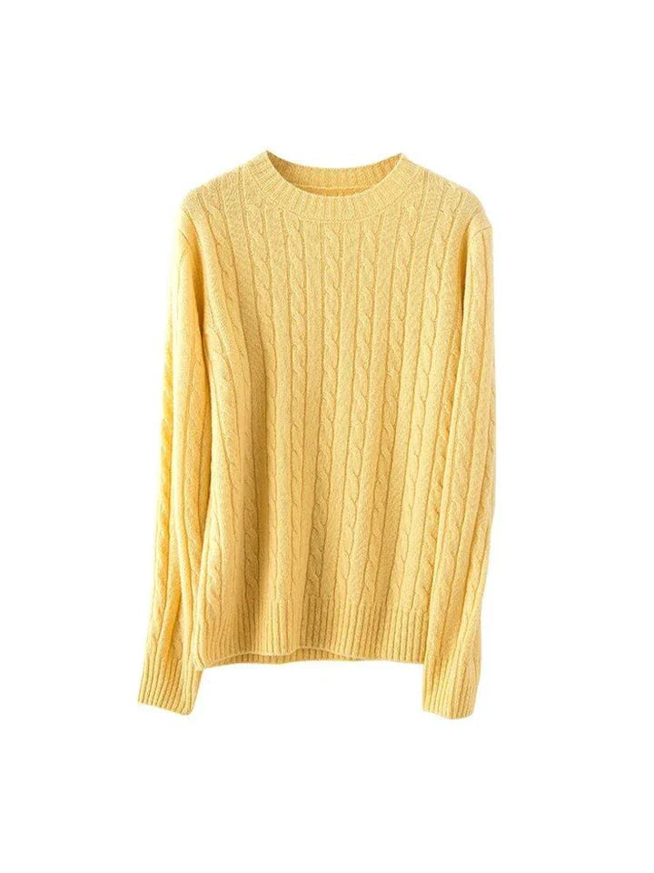 A luxurious 100% British wool cable knit jumper in a rich camel colour, perfect for keeping warm during the UK's chilly winters.