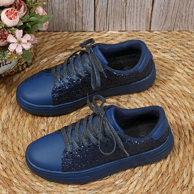 Glittering sequin flats with thick soles and lace-up closure in various vibrant colours