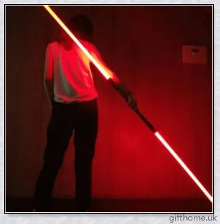 Premium dual-bladed lightsaber with sleek silver hilt, vibrant light modes, and sound effects for authentic Star Wars gameplay