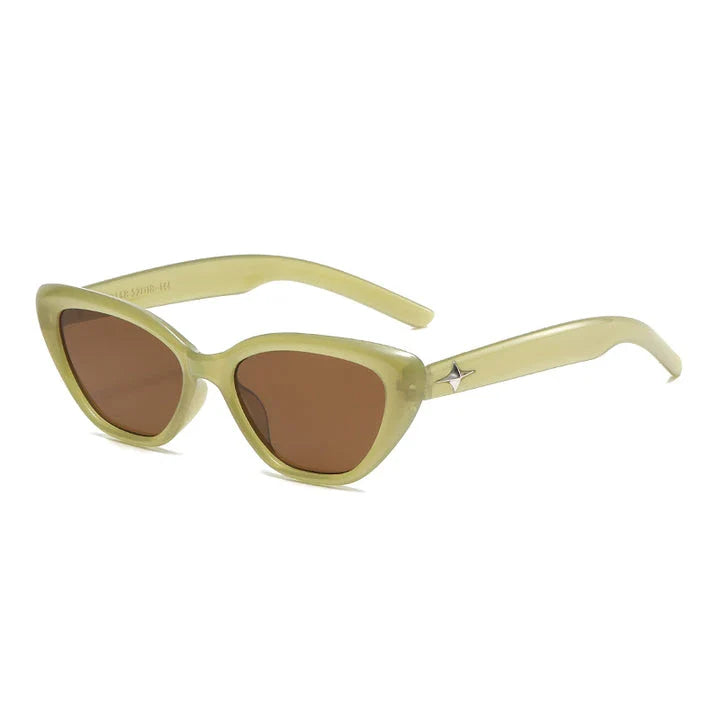 Classic cat-eye sunglasses with rice nail detail, offering UV protection and gradient lenses for a timeless, sophisticated look.