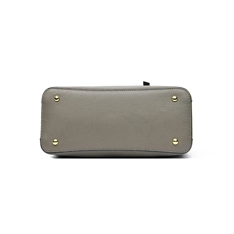 Premium cowhide crossbody handbag in various colour options, featuring a stylish and versatile design for discerning middle-aged shoppers