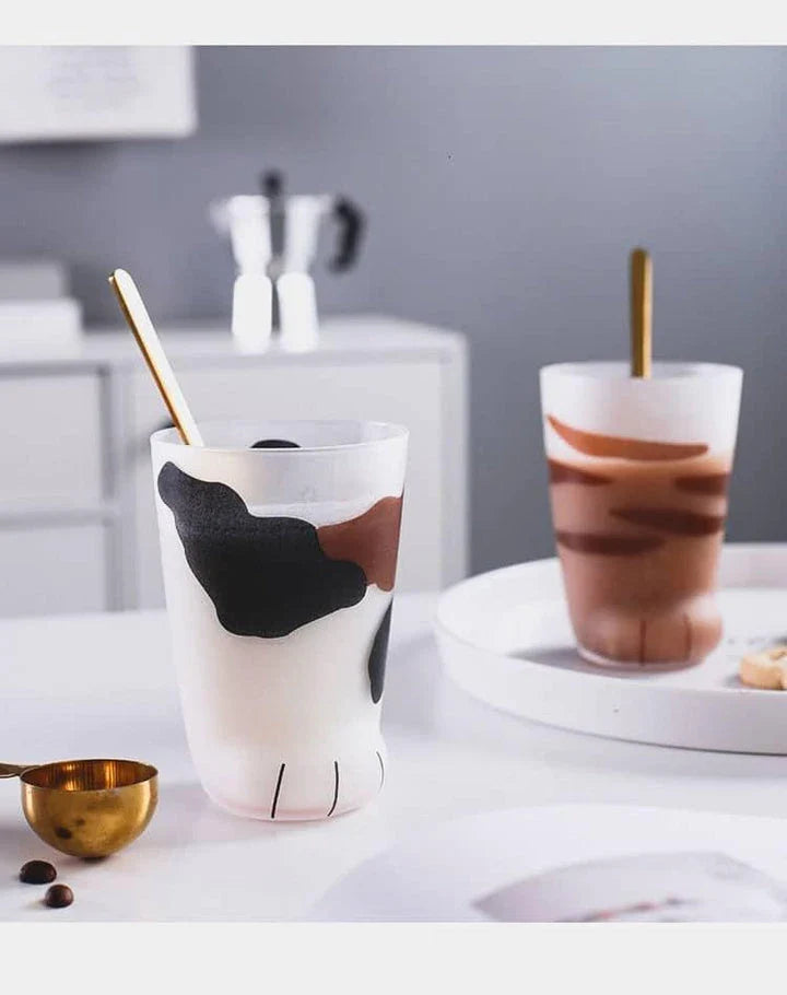 Charming cat paw shaped glass mug with a generous 301-400 ml capacity, perfect for enjoying your favourite hot beverage
