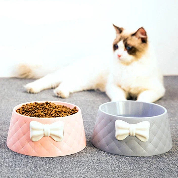 Stylish bowknot feeding bowl for pets, available in blue, grey, and pink colours