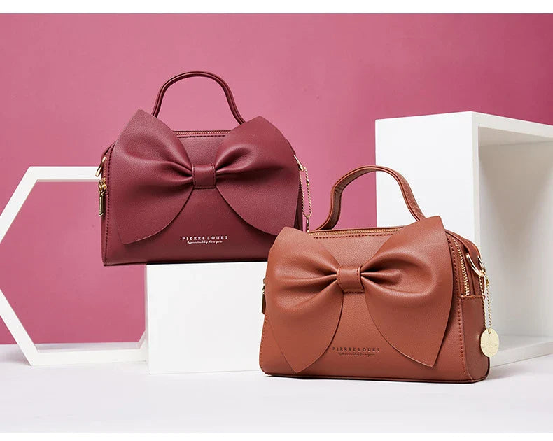 Elegant brown Korean-inspired bow shoulder bag with adjustable strap and roomy interior