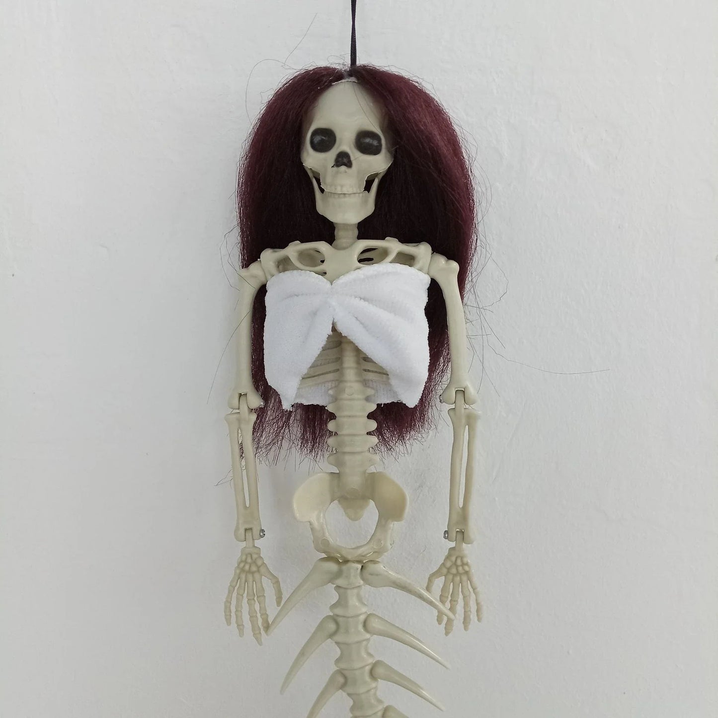 Mermaid bone pendant decoration in brown, dark purple, burgundy, and lake blue colours, ideal for Halloween outdoor courtyard displays