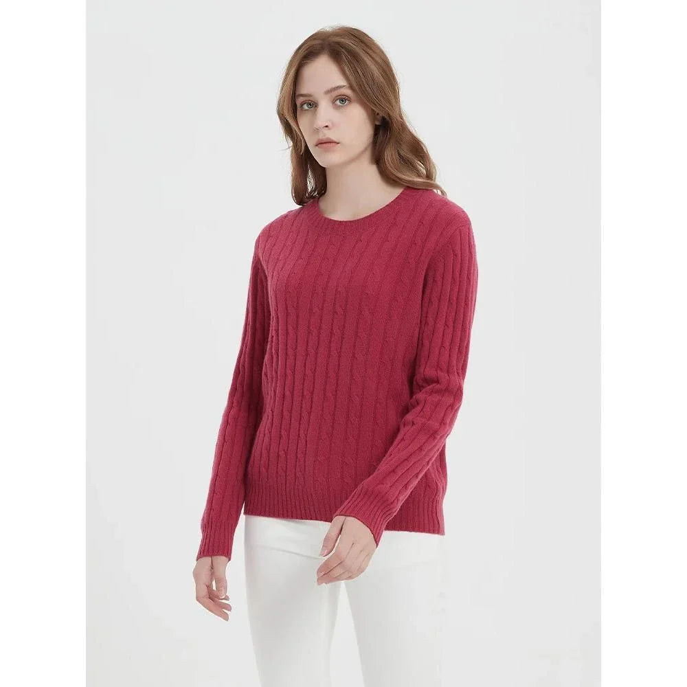 A luxurious 100% British wool cable knit jumper in a rich camel colour, perfect for keeping warm during the UK's chilly winters.