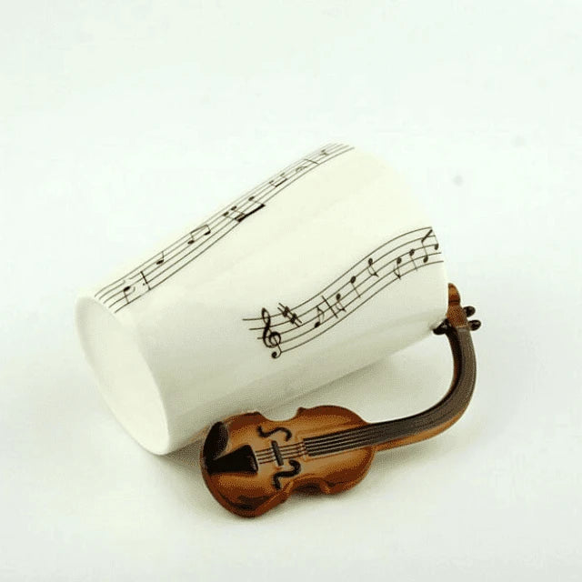 Premium eco-friendly ceramic mug with unique musical instrument-themed designs, a charming and sustainable addition to any kitchen.