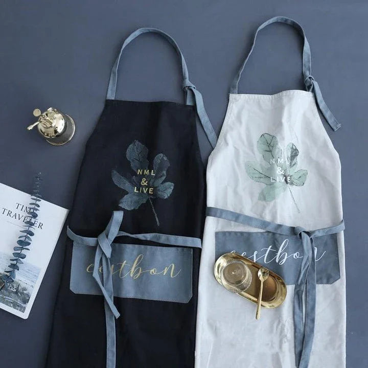 Premium cotton barista apron with a beautiful coconut leaf print design, perfect for coffee shop staff