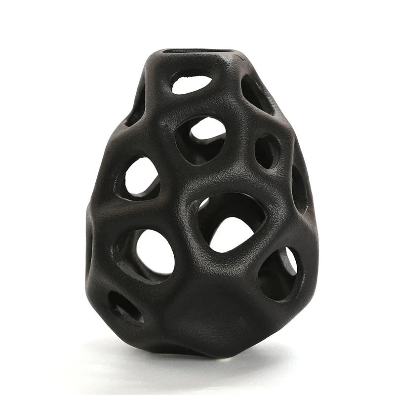 Stylish ceramic decorative balls in geometric design, available in white and black, small and large sizes, for modern home decor