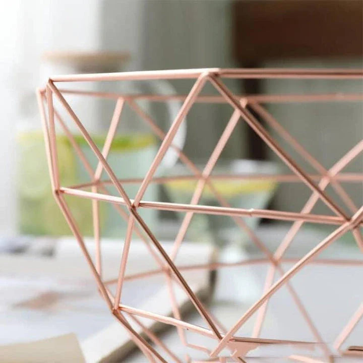 Elegant wrought iron storage basket with intricate design, perfect for home decor and versatile storage solutions