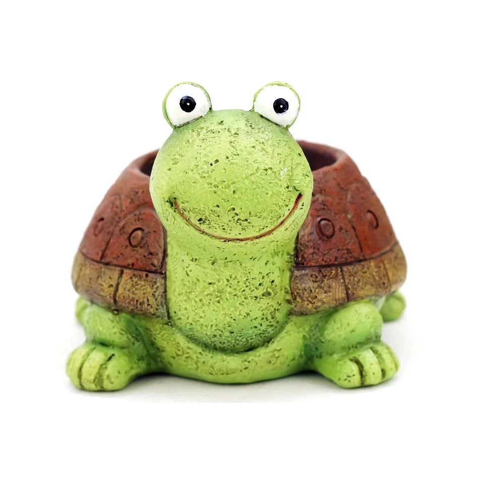 A charming, hand-painted resin planter in the shape of a cartoon turtle, perfect for displaying succulents, cacti, and other small plants.