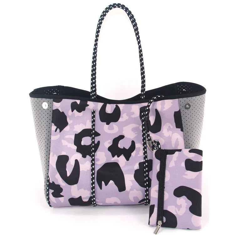 A neoprene beach bag in a stylish design, perfect for British summer adventures at the coast