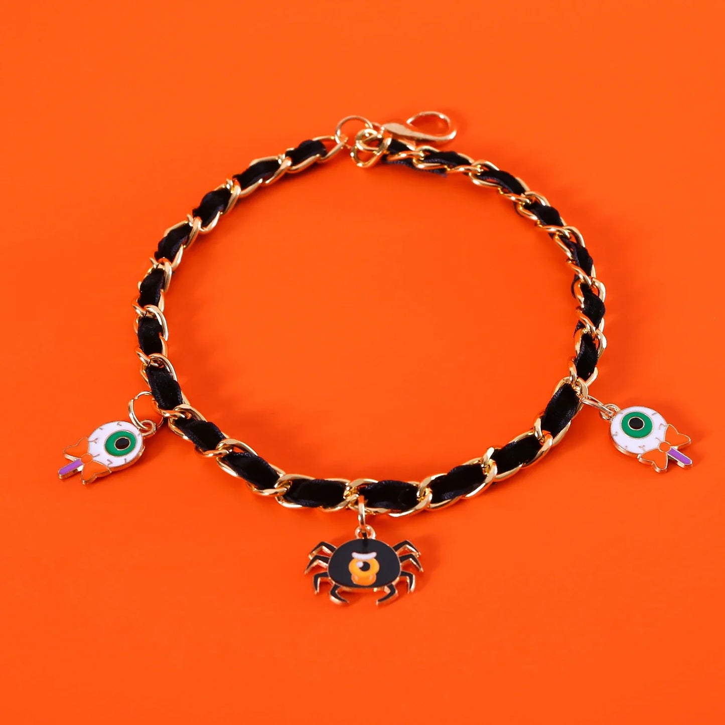 A pet collar made of premium velvet with metal bat charms, perfect for Halloween festivities
