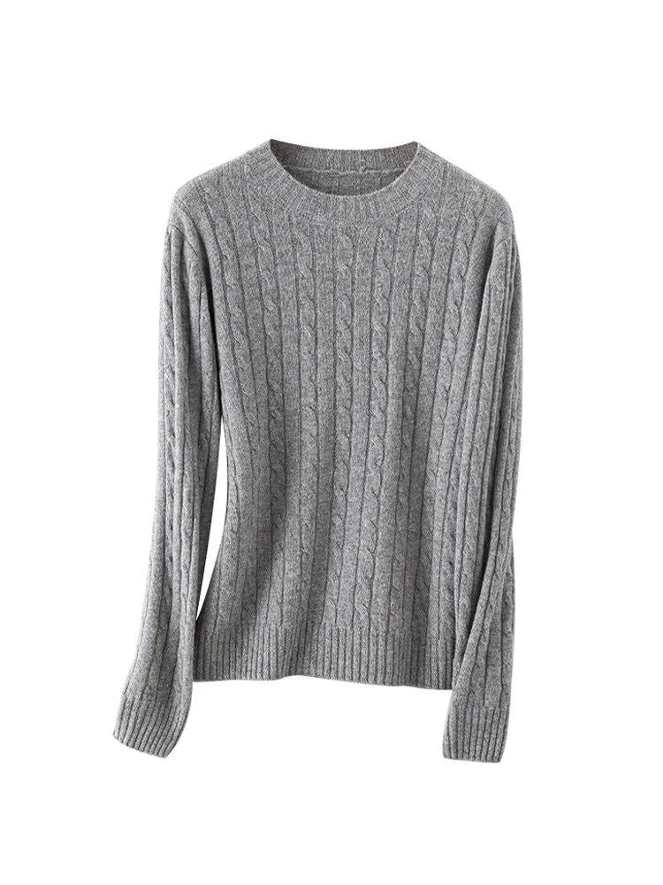 A luxurious 100% British wool cable knit jumper in a rich camel colour, perfect for keeping warm during the UK's chilly winters.
