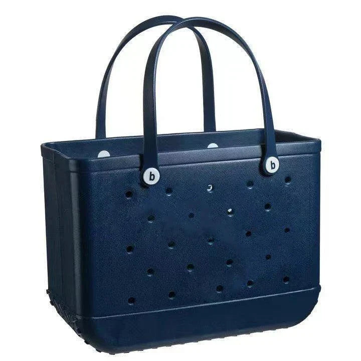 Premium waterproof beach tote bag in various vibrant colours, featuring spacious main compartment and multiple pockets for organised storage