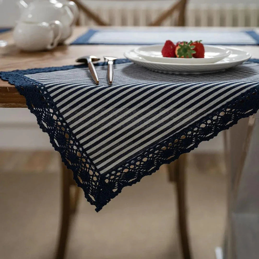 Elegant geometric lace placemats in red and blue stripes, designed to protect and decorate your dining table