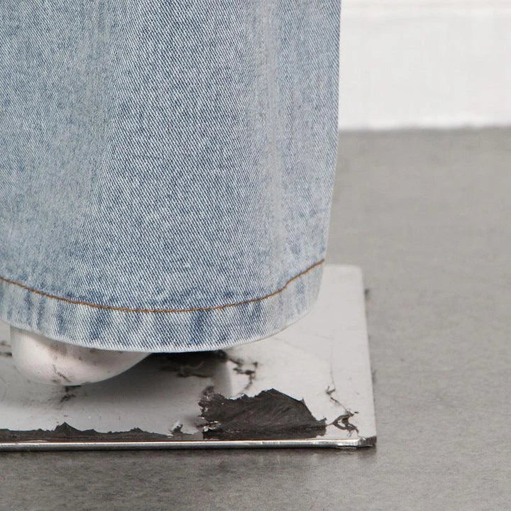 High-waisted wide-leg denim trousers in a stylish blue colour, featuring a comfortable and flattering fit