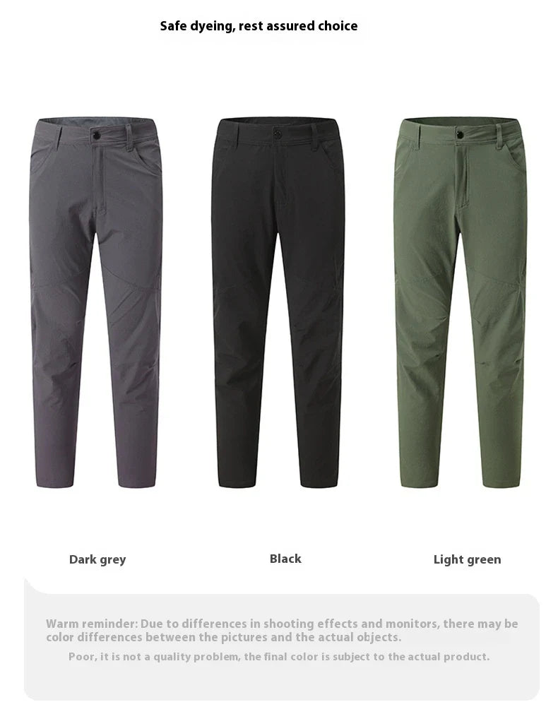 Weatherproof outdoor trousers for men in black, gray, and green colours with adjustable waistband and reinforced panels