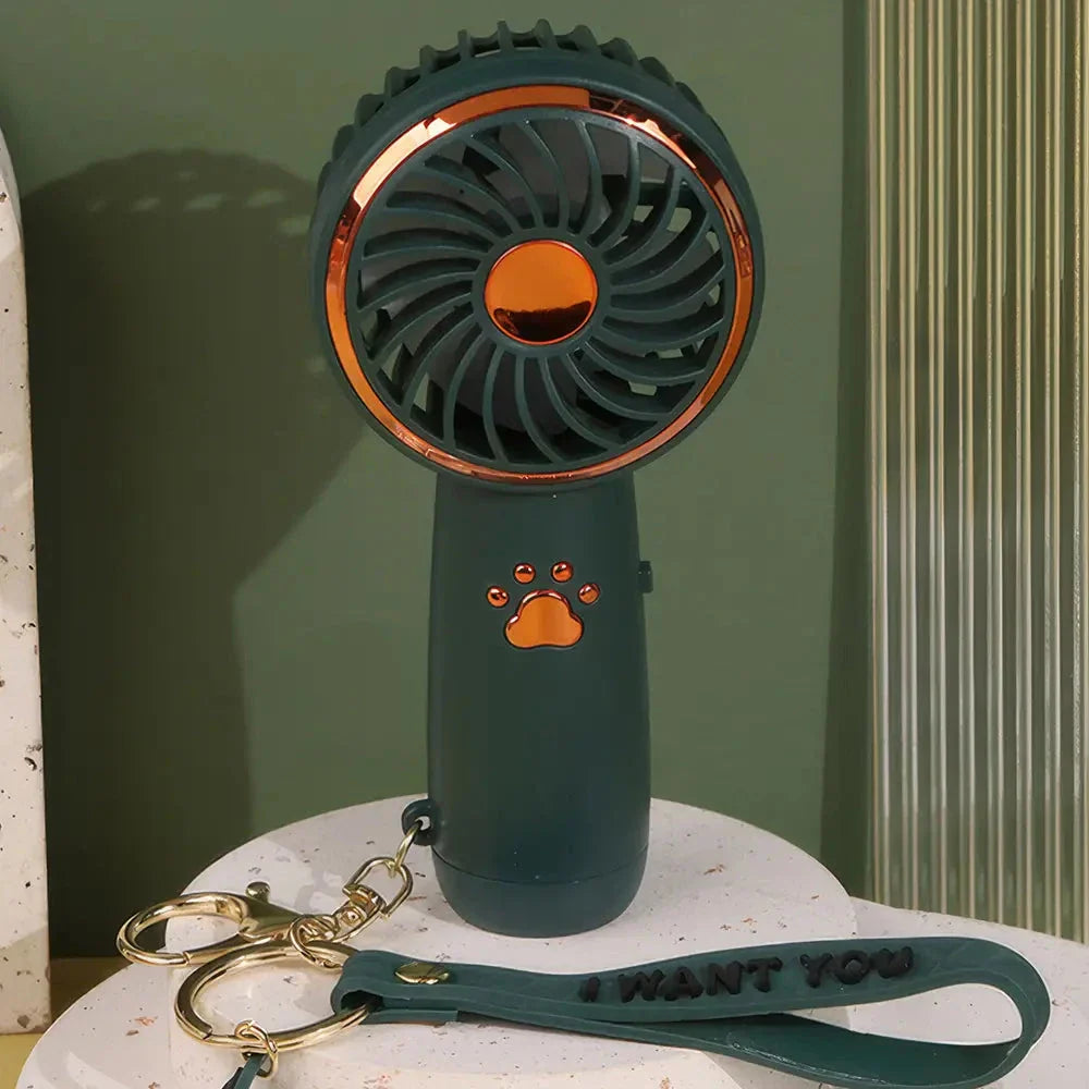 Compact, cartoon-themed USB handheld fan for keeping cool during the summer months