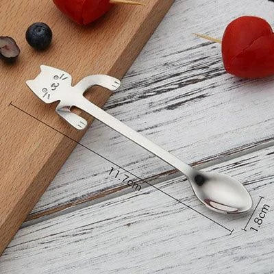A silver cat-shaped stainless steel coffee spoon with a polished finish