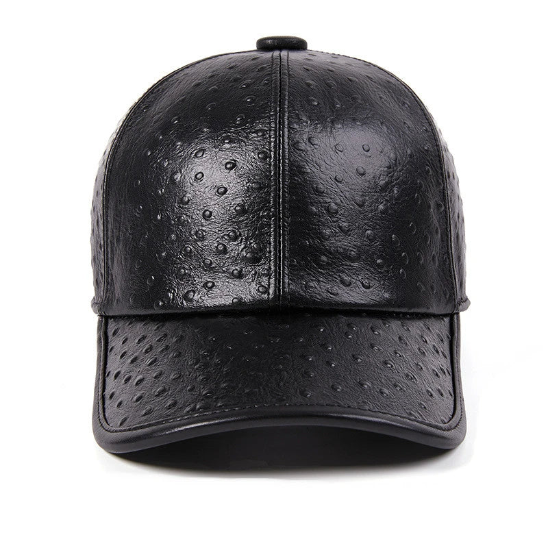 A stylish men's baseball cap made from warm, first-layer cowhide leather with an eye-catching ostrich pattern design.