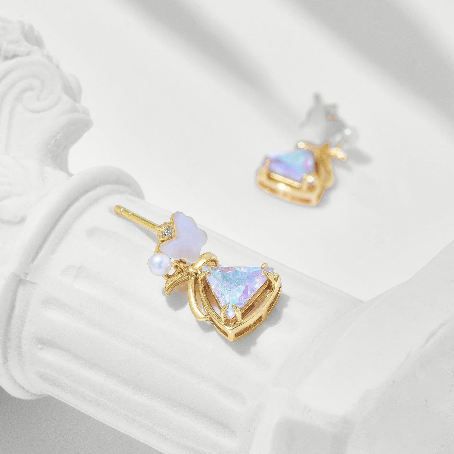 Elegant sterling silver butterfly earrings with a delicate and whimsical design, perfect for adding a touch of natural beauty to any outfit.