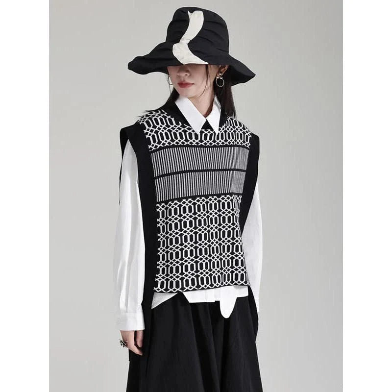 Women's black sleeveless vest with irregular knitting pattern, a versatile and stylish layering piece for the modern British woman