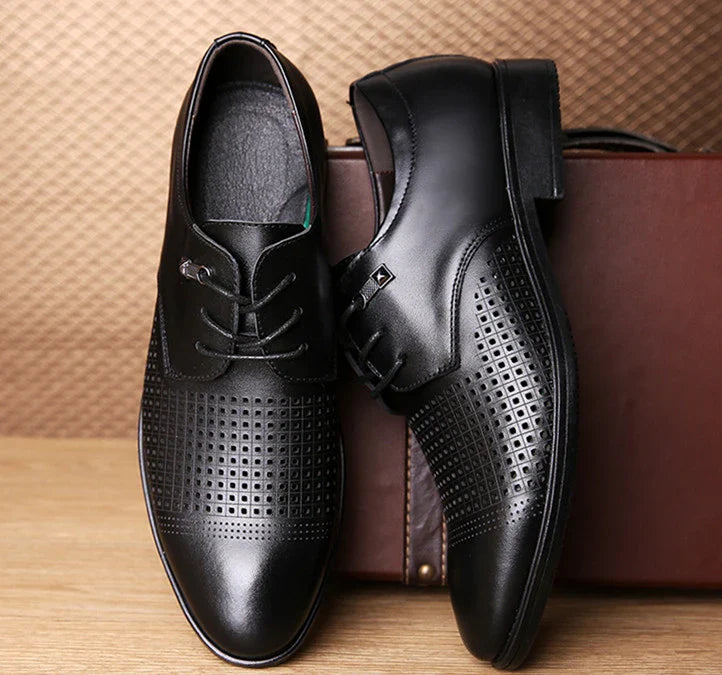 Stylish and comfortable black casual loafers made from breathable microfibre leather for the modern UK man