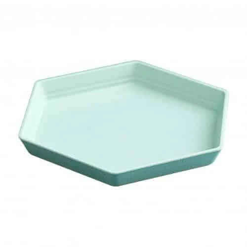 Hexagon-shaped wheat straw plate in a neutral beige colour, showcasing a modern and eco-friendly design