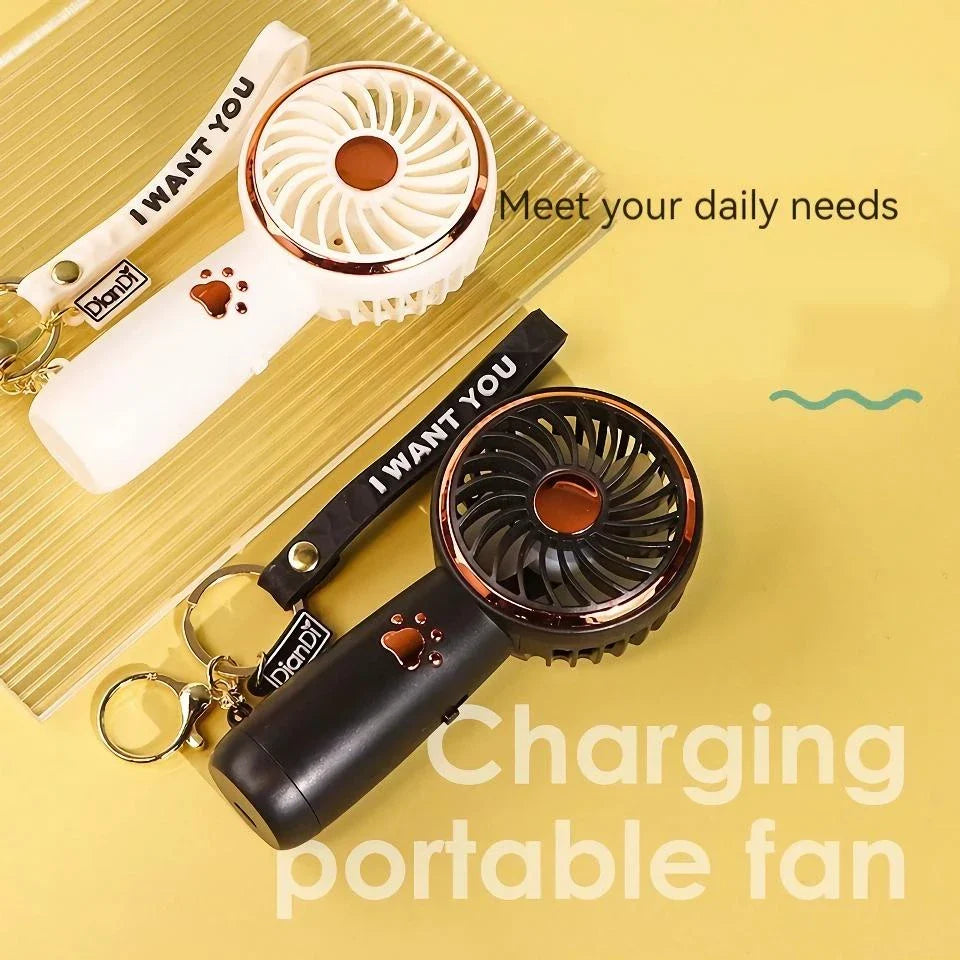 Compact, cartoon-themed USB handheld fan for keeping cool during the summer months